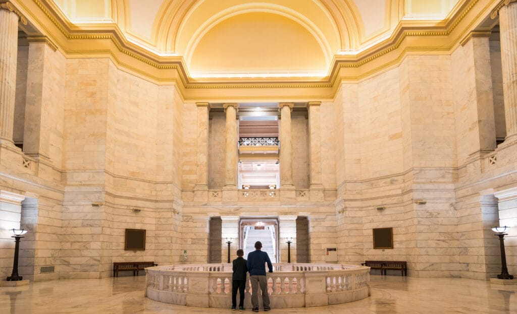 Father and son visit the Arkansas State Capitol building in Little Rock, Arkansas. 