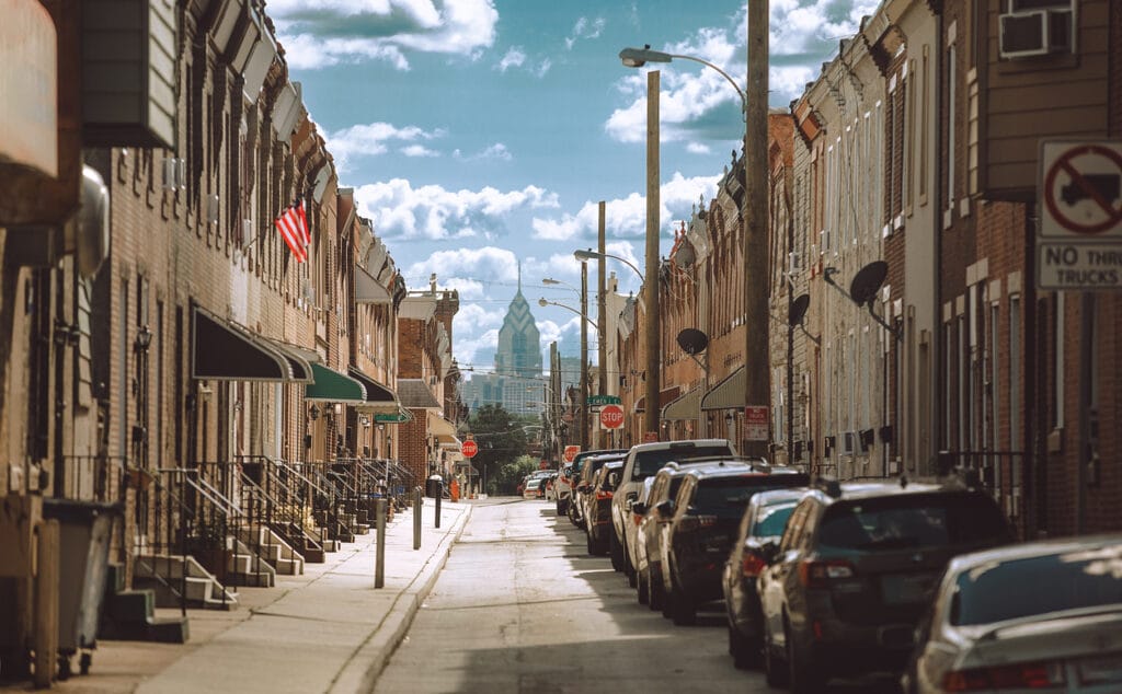 A linear perspective of residential buildings overlooking a modern city in Port Richmond Philadelphia, Pa.  