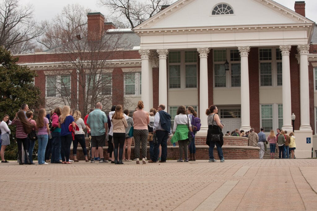 Fredericksburg, VA, USA - April 3, 2015: Families and prospective college students visit the University of Mary Washington for the campus tour