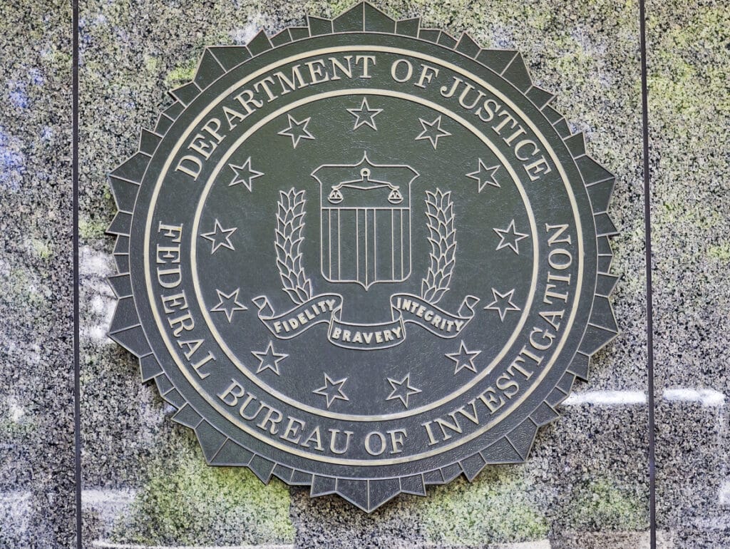 Washington DC, USA-June 5, 2018: J. Edgar Hoover FBI wall emblem on the side of the FBI Building