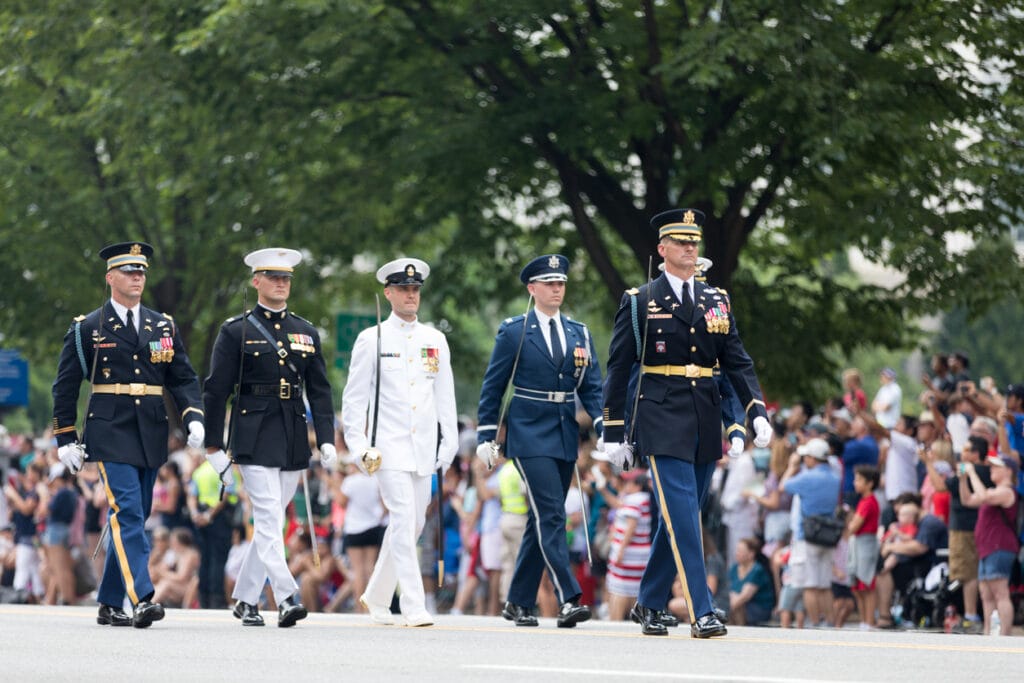 Washington, D.C., - July 4, 2018, Members of the United states military march with swords at the National Independence Day Parade