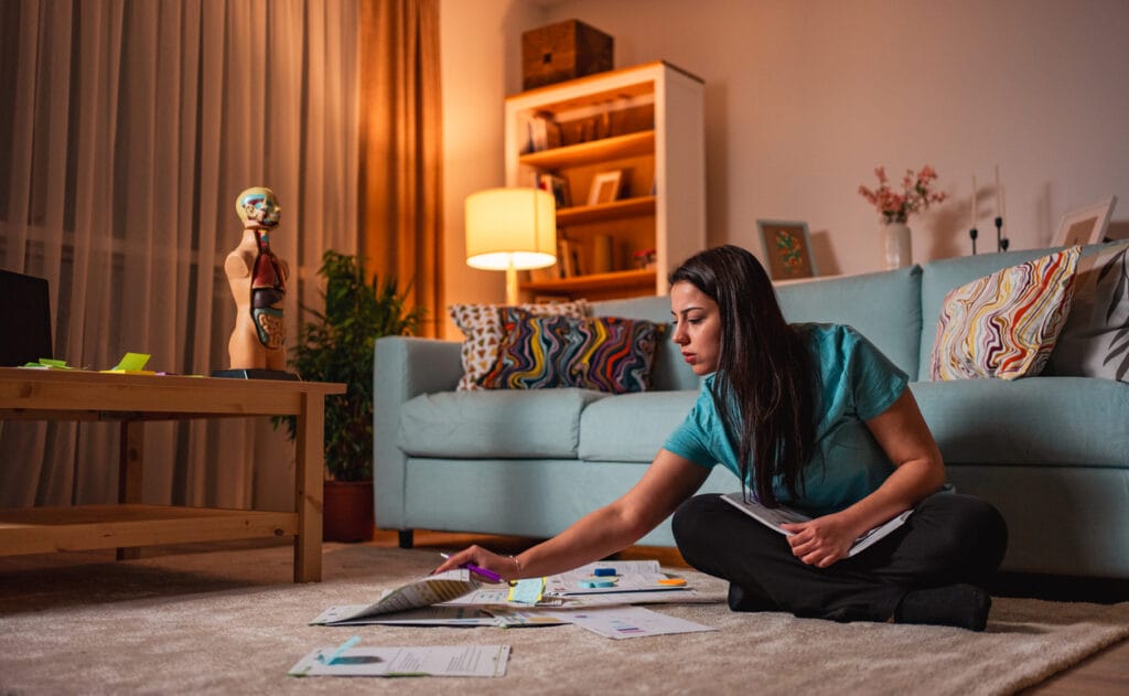 Young woman doing her homework.