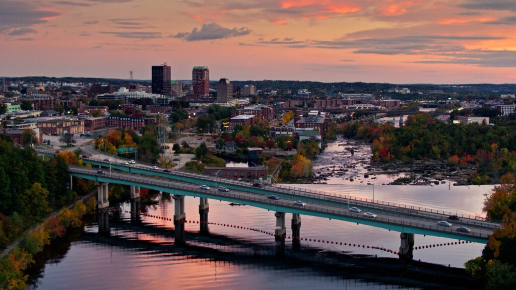 Aerial establishing shot of Manchester, New Hampshire in Fall. 