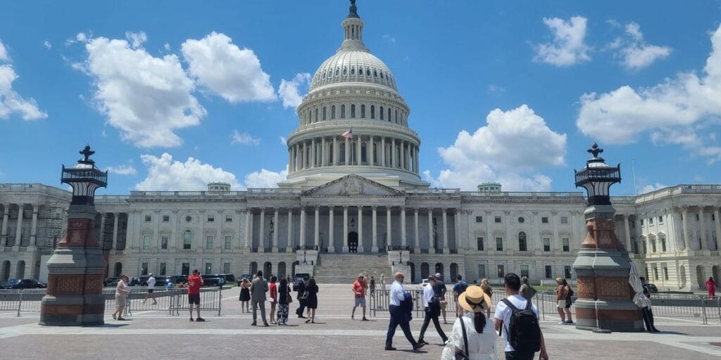 Tourists visiting the Eastern plaza in front of the United States Capitol House of the Representatives, on Capitol Hill in Washington DC, USA.